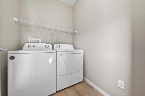 168 Corner Meadows Way Ne, Calgary, AB - Indoor Photo Showing Laundry Room
