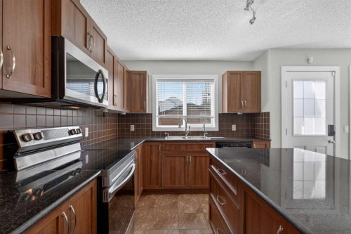 43 Sage Hill Way Nw, Calgary, AB - Indoor Photo Showing Kitchen With Double Sink