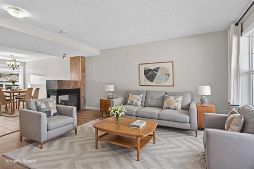 43 Sage Hill Way Nw, Calgary, AB - Indoor Photo Showing Living Room With Fireplace