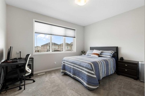 1 Osborne Common Sw, Airdrie, AB - Indoor Photo Showing Bedroom