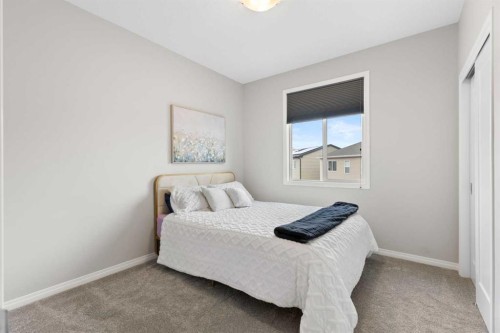 1 Osborne Common Sw, Airdrie, AB - Indoor Photo Showing Bedroom