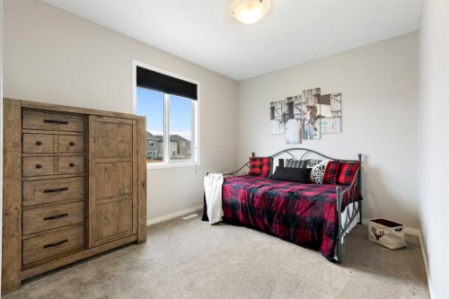 1 Osborne Common Sw, Airdrie, AB - Indoor Photo Showing Bedroom