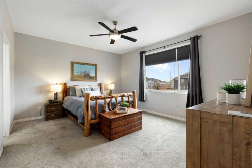1 Osborne Common Sw, Airdrie, AB - Indoor Photo Showing Bedroom