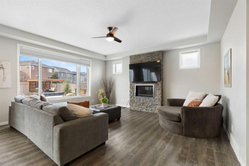 1 Osborne Common Sw, Airdrie, AB - Indoor Photo Showing Living Room With Fireplace