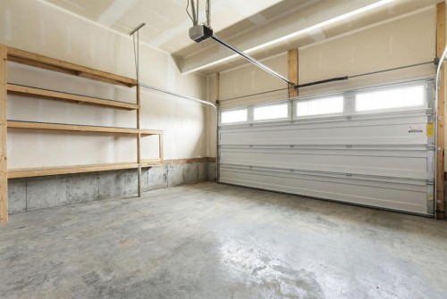 1 Osborne Common Sw, Airdrie, AB - Indoor Photo Showing Garage