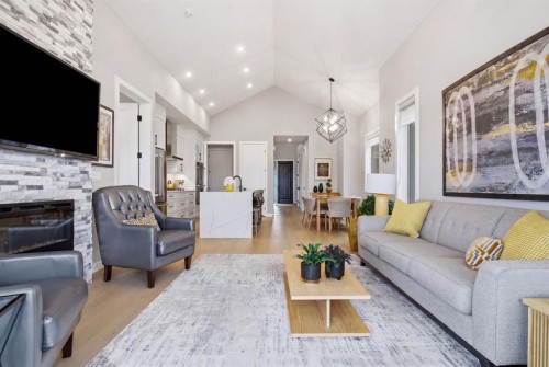 408 Crestridge Common Sw, Calgary, AB - Indoor Photo Showing Living Room With Fireplace
