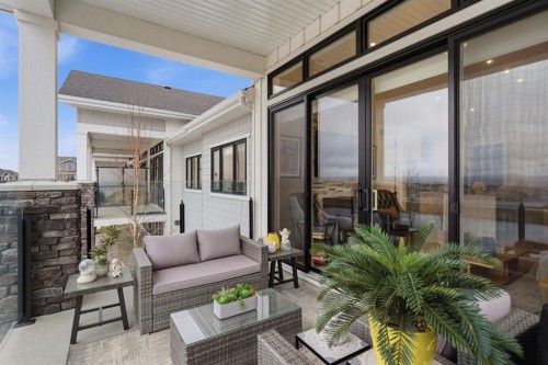 408 Crestridge Common Sw, Calgary, AB - Outdoor With Deck Patio Veranda With Exterior