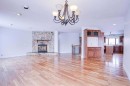264201 Range Road 12 Sw, Airdrie, AB  - Indoor Photo Showing Living Room With Fireplace 