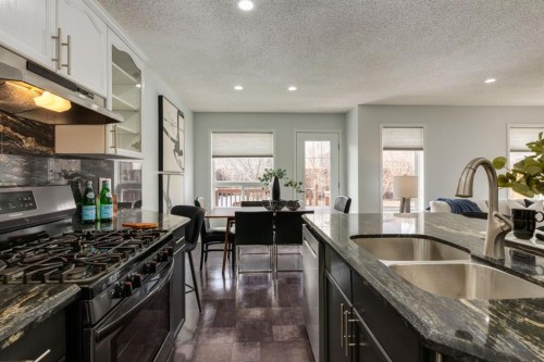 82 Hidden Ridge View Nw, Calgary, AB - Indoor Photo Showing Kitchen With Double Sink
