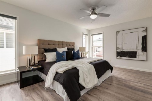 82 Hidden Ridge View Nw, Calgary, AB - Indoor Photo Showing Bedroom