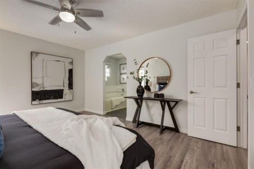 82 Hidden Ridge View Nw, Calgary, AB - Indoor Photo Showing Bedroom