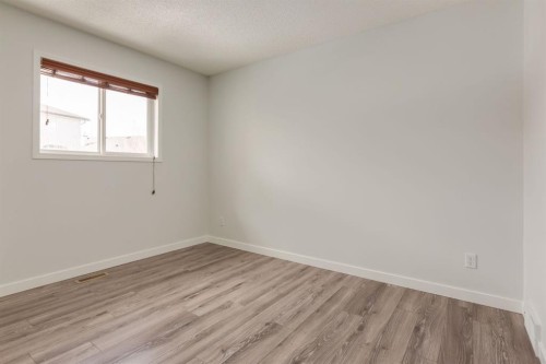 82 Hidden Ridge View Nw, Calgary, AB - Indoor Photo Showing Other Room