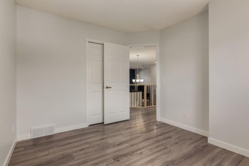 82 Hidden Ridge View Nw, Calgary, AB - Indoor Photo Showing Other Room