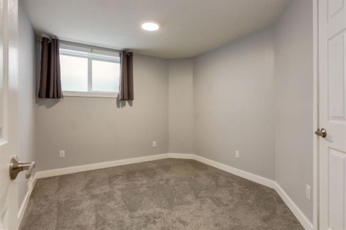 82 Hidden Ridge View Nw, Calgary, AB - Indoor Photo Showing Other Room