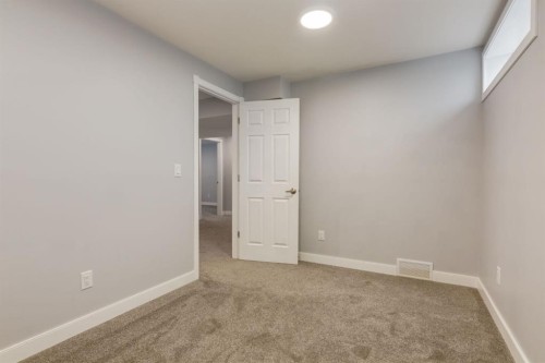 82 Hidden Ridge View Nw, Calgary, AB - Indoor Photo Showing Other Room