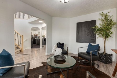 82 Hidden Ridge View Nw, Calgary, AB - Indoor Photo Showing Living Room