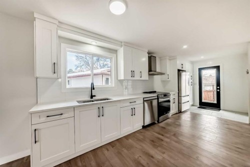 5173 Whitestone Road Ne, Calgary, AB - Indoor Photo Showing Kitchen With Double Sink