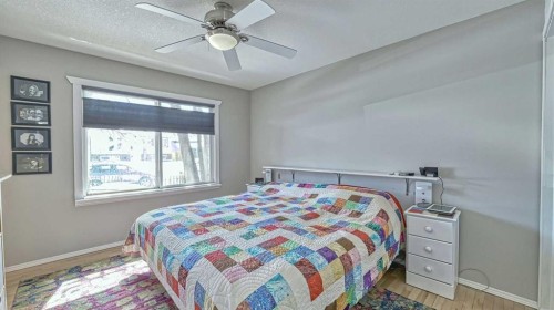 64 Midglen Drive Se, Calgary, AB - Indoor Photo Showing Bedroom