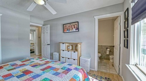 64 Midglen Drive Se, Calgary, AB - Indoor Photo Showing Bedroom