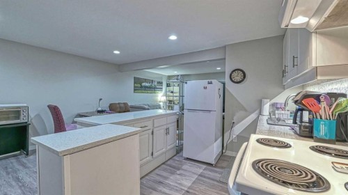64 Midglen Drive Se, Calgary, AB - Indoor Photo Showing Kitchen