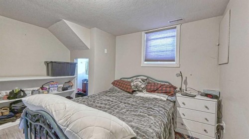 64 Midglen Drive Se, Calgary, AB - Indoor Photo Showing Bedroom