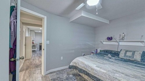 64 Midglen Drive Se, Calgary, AB - Indoor Photo Showing Bedroom