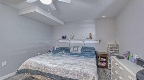 64 Midglen Drive Se, Calgary, AB - Indoor Photo Showing Bedroom