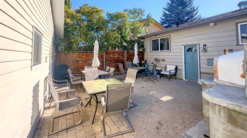 64 Midglen Drive Se, Calgary, AB - Outdoor With Deck Patio Veranda With Exterior
