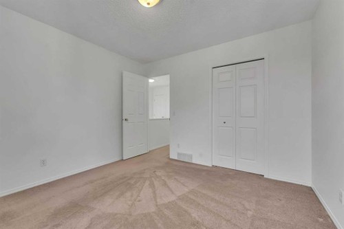 338 Panamount Drive Nw, Calgary, AB - Indoor Photo Showing Other Room