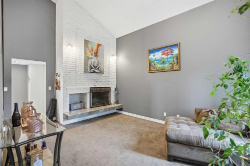 2608 Deer Side Drive Se, Calgary, AB - Indoor With Fireplace