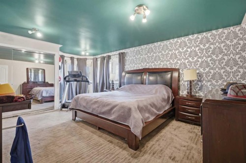 2608 Deer Side Drive Se, Calgary, AB - Indoor Photo Showing Bedroom