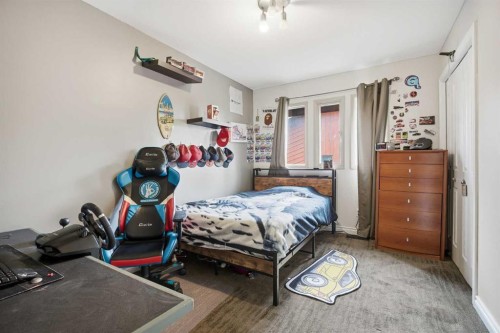 2608 Deer Side Drive Se, Calgary, AB - Indoor Photo Showing Bedroom