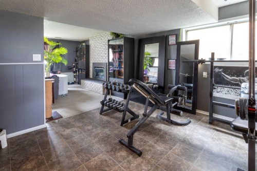 2822 13 Avenue Se, Calgary, AB - Indoor Photo Showing Gym Room