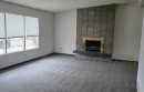 2822 13 Avenue Se, Calgary, AB  - Indoor Photo Showing Living Room With Fireplace 