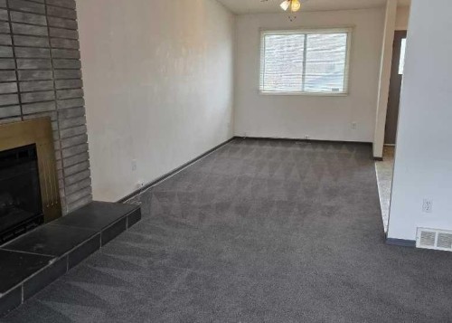 2822 13 Avenue Se, Calgary, AB - Indoor Photo Showing Other Room With Fireplace