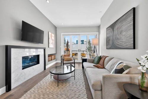 4905 21 Street Sw, Calgary, AB - Indoor Photo Showing Living Room With Fireplace