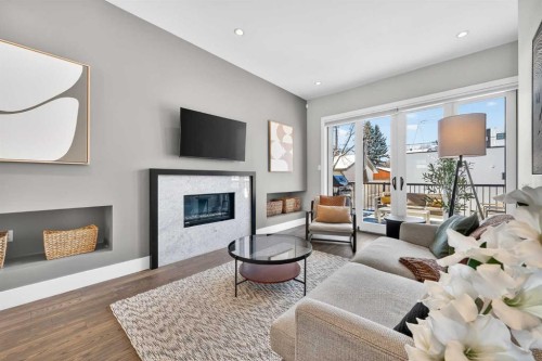4905 21 Street Sw, Calgary, AB - Indoor Photo Showing Living Room With Fireplace