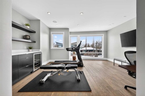 4905 21 Street Sw, Calgary, AB - Indoor Photo Showing Gym Room