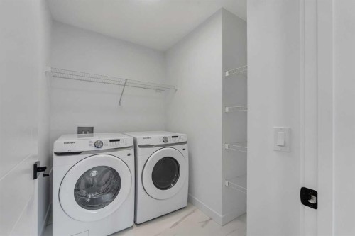 150 Belvedere Crescent Se, Calgary, AB - Indoor Photo Showing Laundry Room