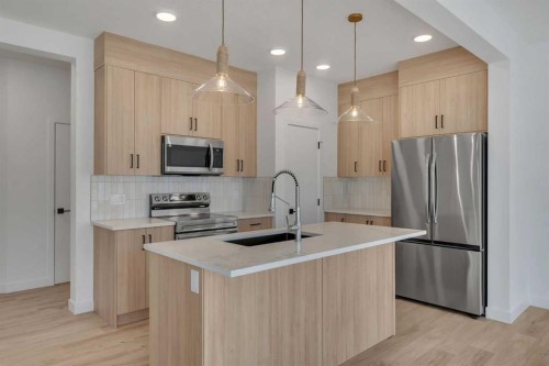 150 Belvedere Crescent Se, Calgary, AB - Indoor Photo Showing Kitchen With Stainless Steel Kitchen With Upgraded Kitchen
