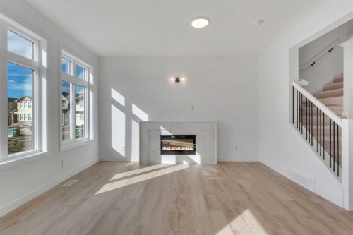150 Belvedere Crescent Se, Calgary, AB - Indoor With Fireplace
