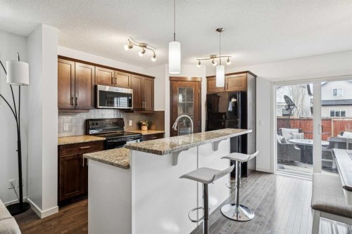 524 Cranston Drive Se, Calgary, AB - Indoor Photo Showing Kitchen With Upgraded Kitchen