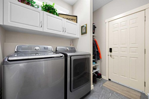 106 Evergreen Common Sw, Calgary, AB - Indoor Photo Showing Laundry Room