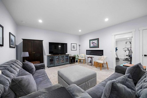 106 Evergreen Common Sw, Calgary, AB - Indoor Photo Showing Living Room