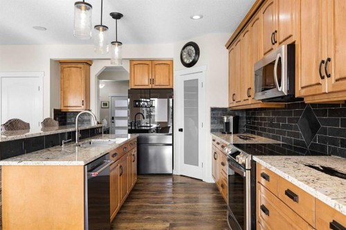 106 Evergreen Common Sw, Calgary, AB - Indoor Photo Showing Kitchen With Upgraded Kitchen