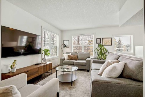 369 Mckenzie Towne Gate Se, Calgary, AB - Indoor Photo Showing Living Room