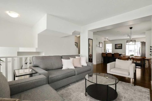 369 Mckenzie Towne Gate Se, Calgary, AB - Indoor Photo Showing Living Room