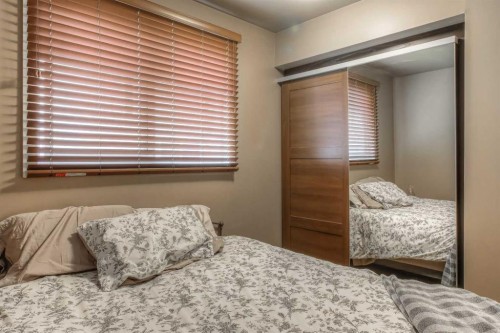 172 Oaktree Lane Sw, Calgary, AB - Indoor Photo Showing Bedroom