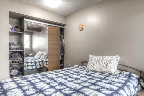 172 Oaktree Lane Sw, Calgary, AB - Indoor Photo Showing Bedroom