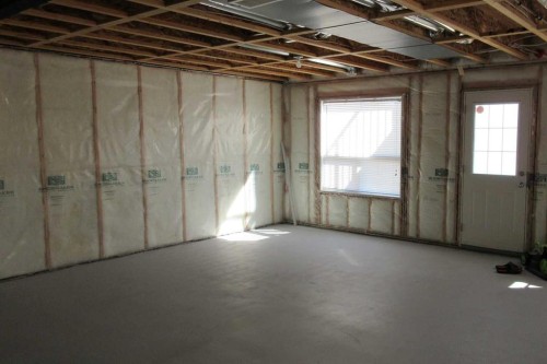 33 Evanscove Manor Nw, Calgary, AB - Indoor Photo Showing Basement